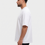 Oversized Cotton T-Shirt White — zijkant, oversized fit met dropped shoulders