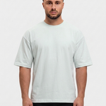 Oversized Cotton T-Shirt Mint — voorkant, Calvin (1,83 m) draagt maat S