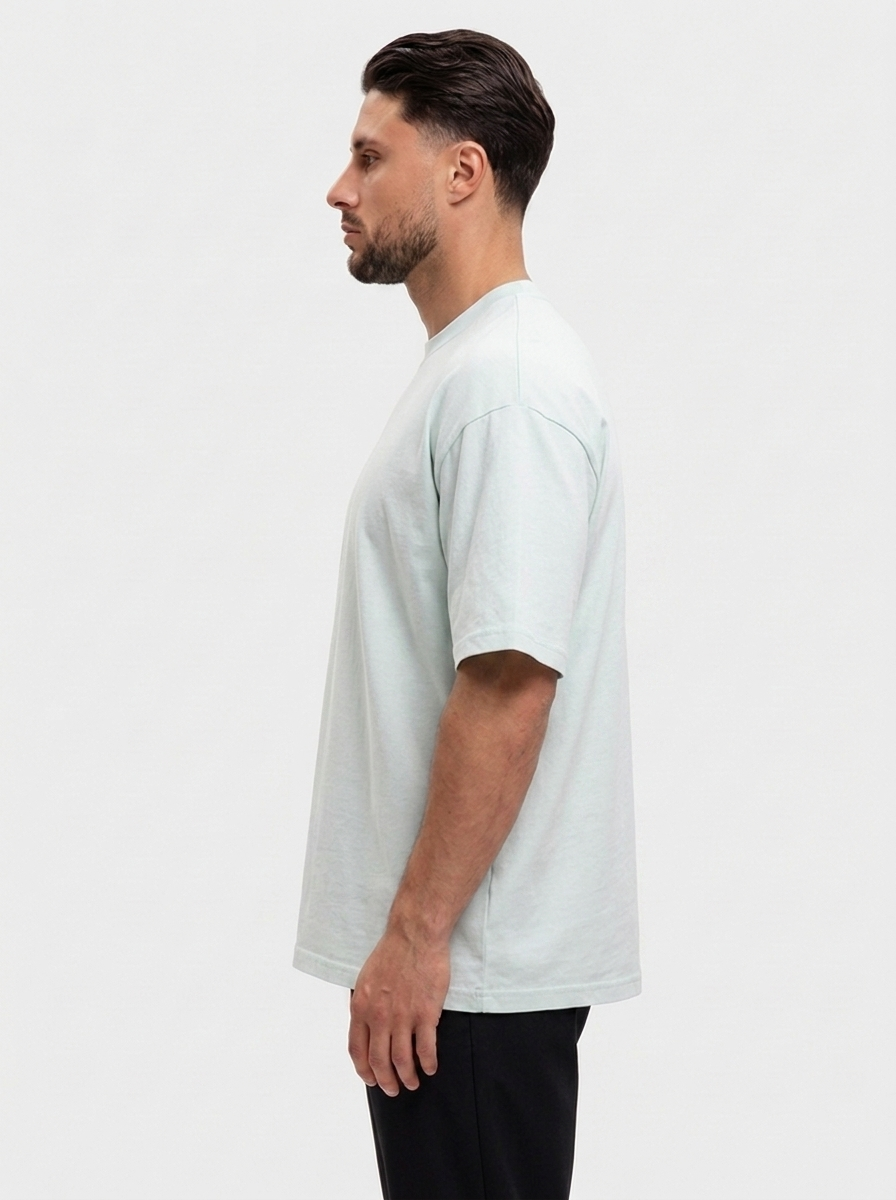 Oversized Cotton T-Shirt Mint — zijkant, oversized fit met dropped shoulders